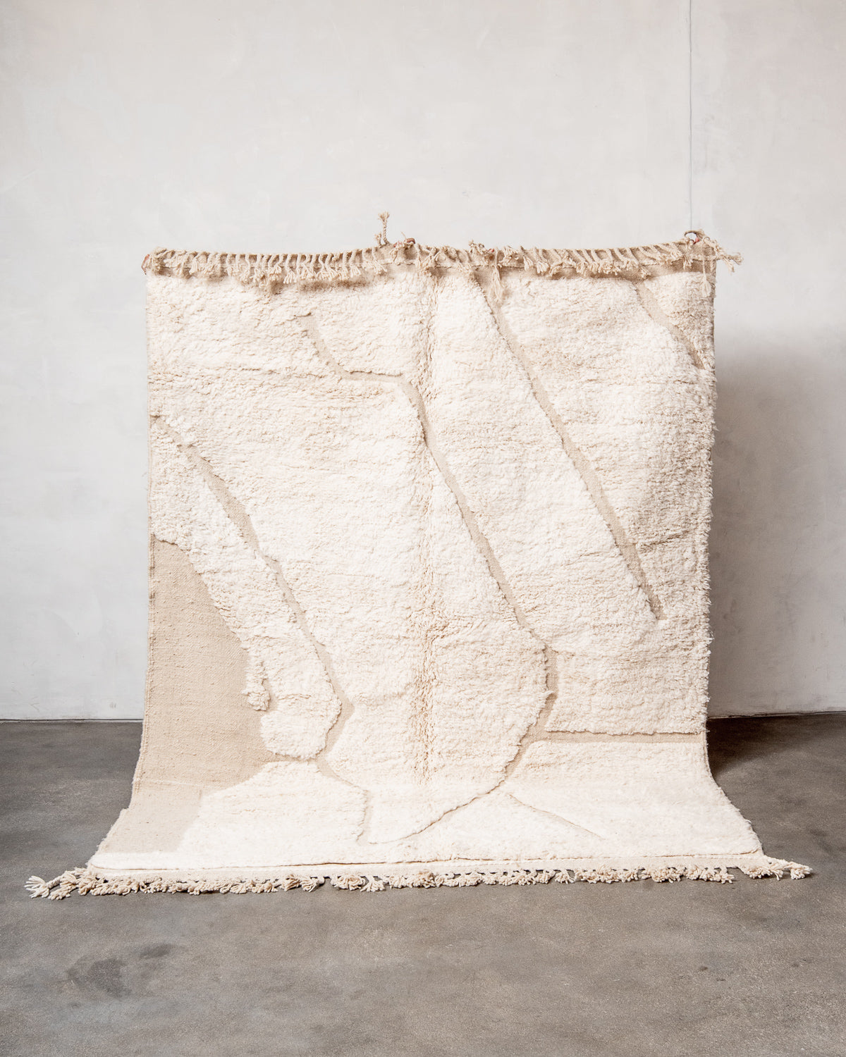 Modern, designer, handcrafted Berber rug from Morocco. Beniourain carpet with beautiful colours and patterns and fluffy wool texture.